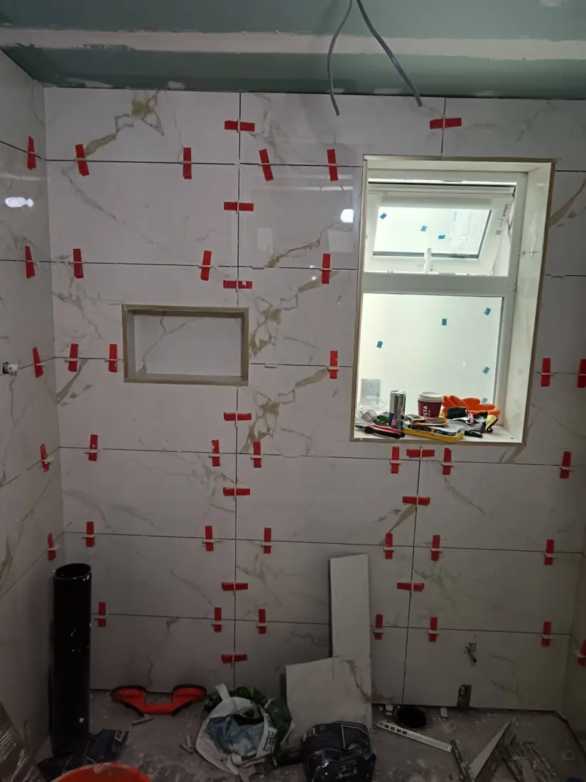 Before: Marble-effect bathroom walls