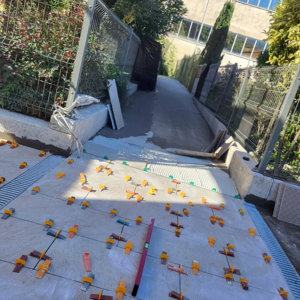 Outdoor porcelain walkway with drainage channel