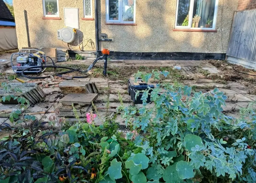Before: Sandstone-effect patio