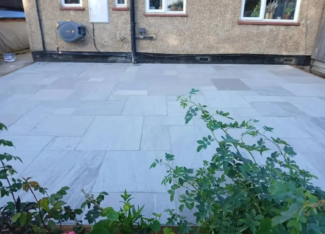After: Sandstone-effect patio